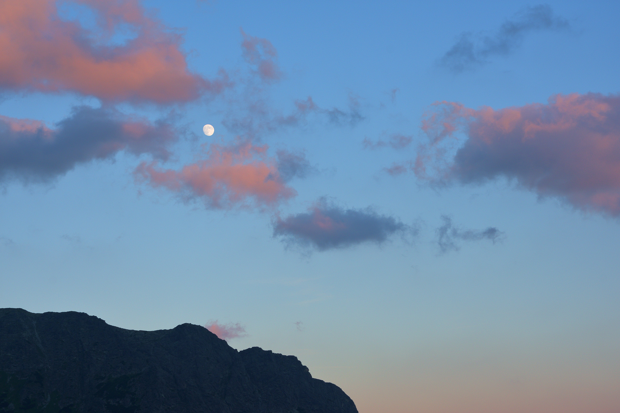 The Moon Above The Earth